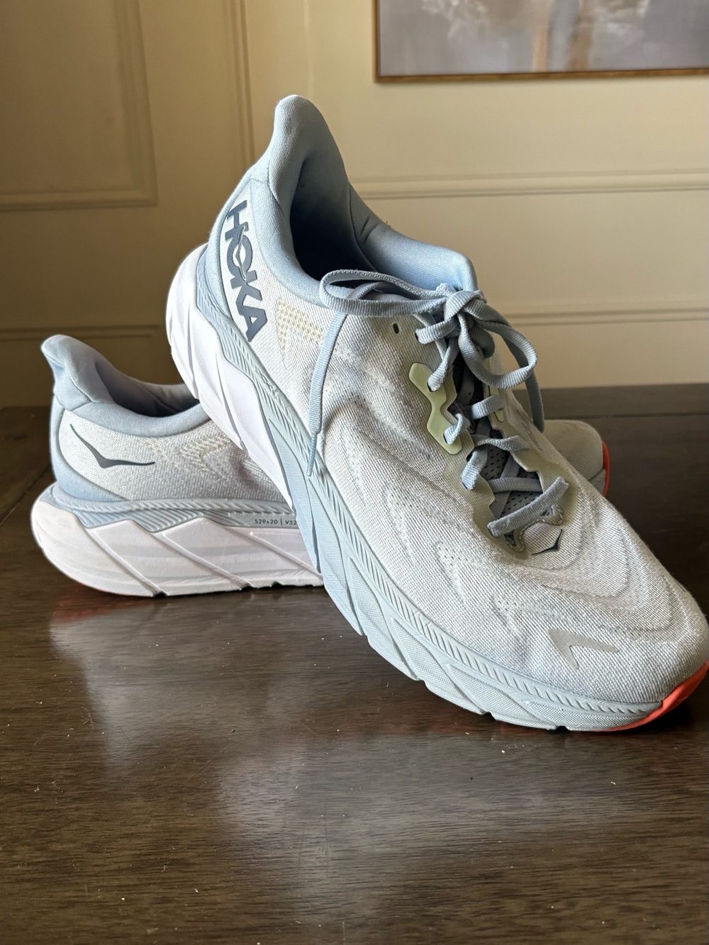 Hoka Light Blue and White Running Sneakers with Subtle Orange Accent